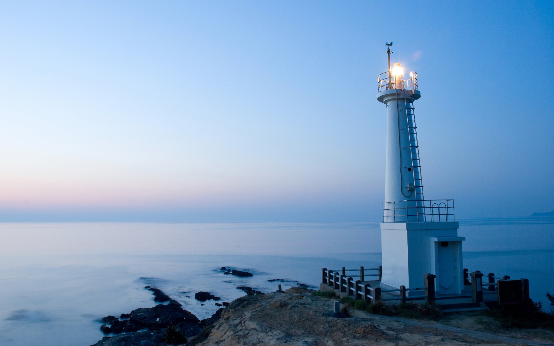 abend leuchtturm ozean reiseleiter