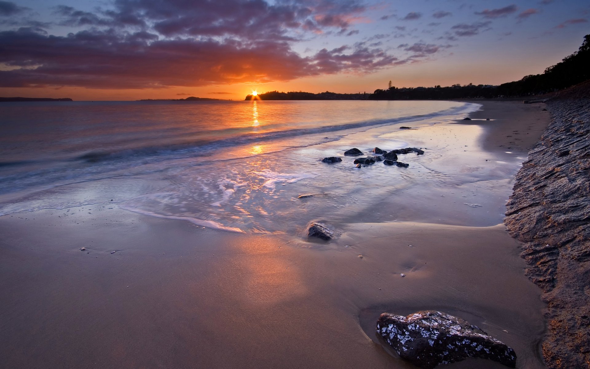 auckland nowa zelandia plaża zachód słońca