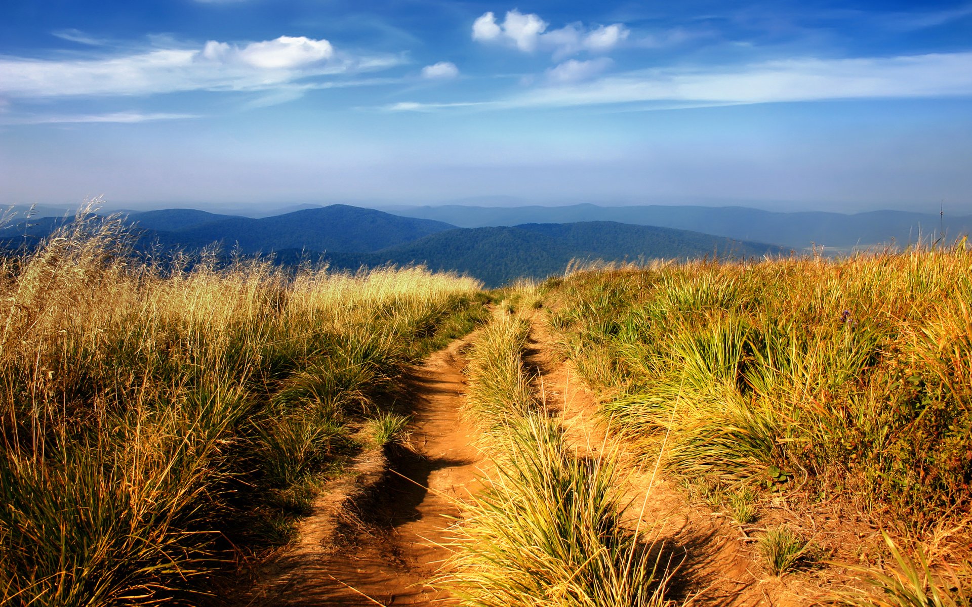 ciel montagnes herbe paysage route pentes collines paysages nature