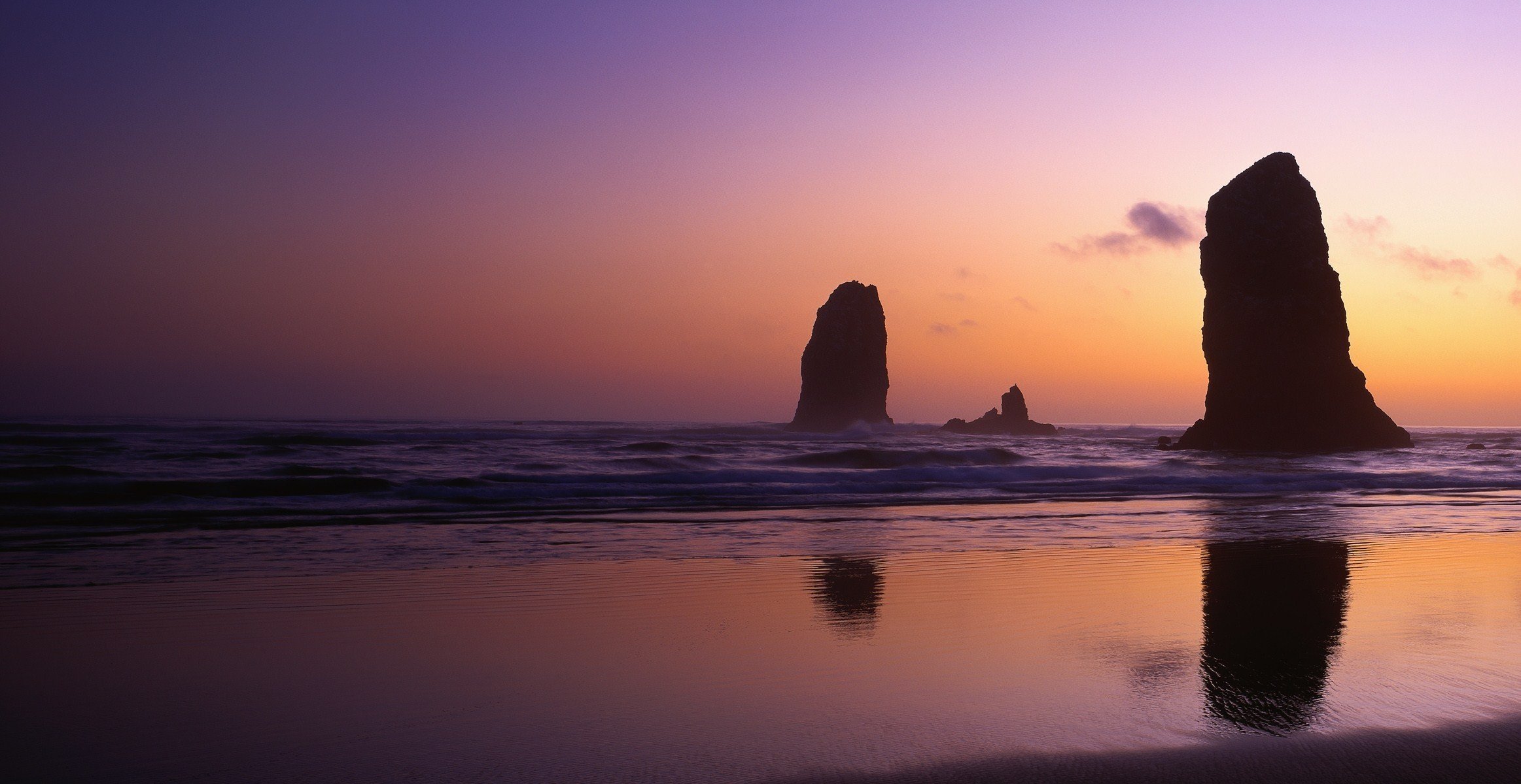 beach water ocean rock sky night nature