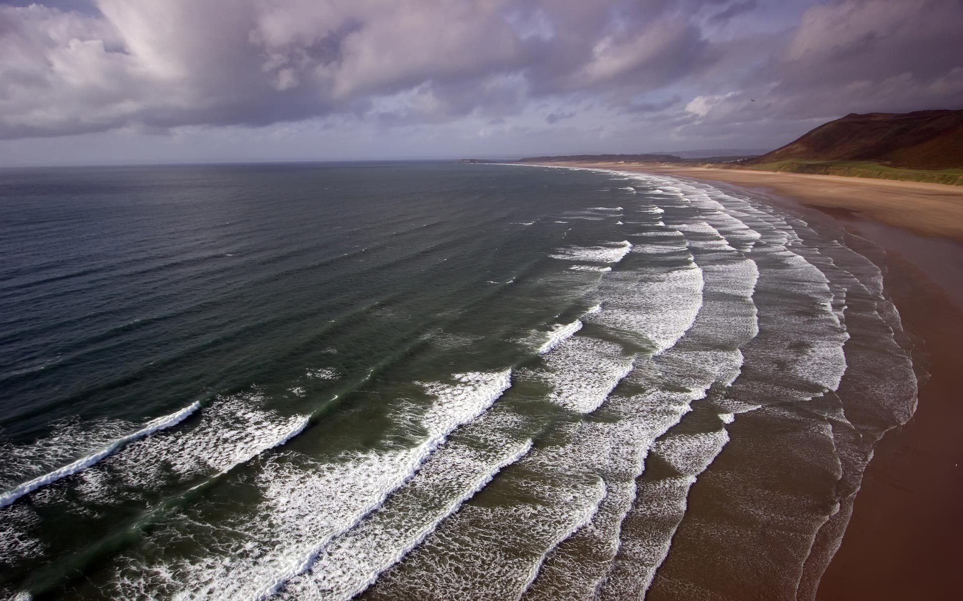 landscape sea beach water shore waves mountain