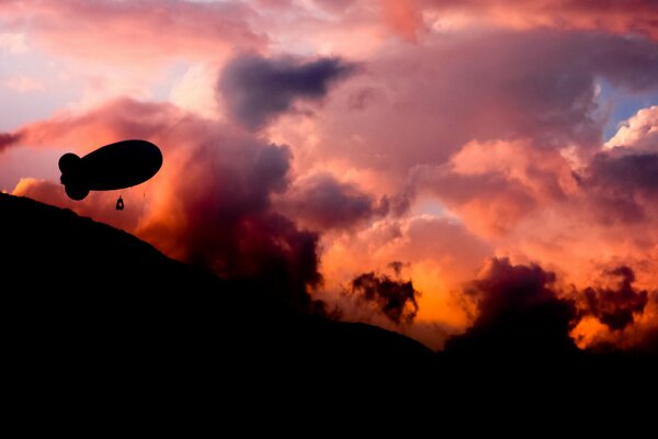 France. The shadow of an airship in the sky