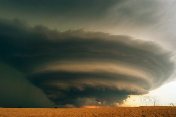 An impending thunderstorm in the field. Thunderstorm vortex