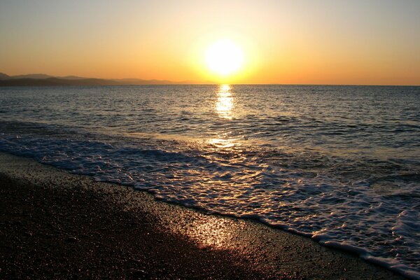 Legitime Sonne am Meer