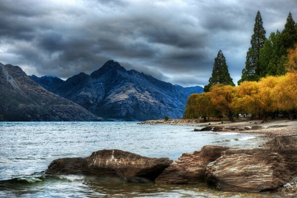 Landscape of mountains and forests. Cloudy nature in the mountains