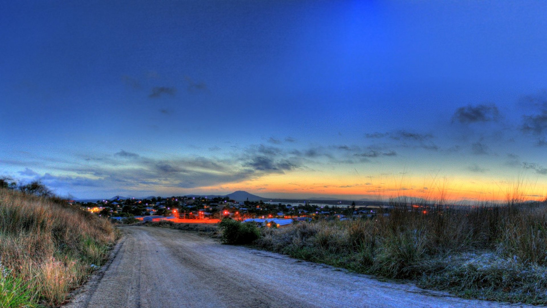 ciel coucher de soleil soir ville lumières route