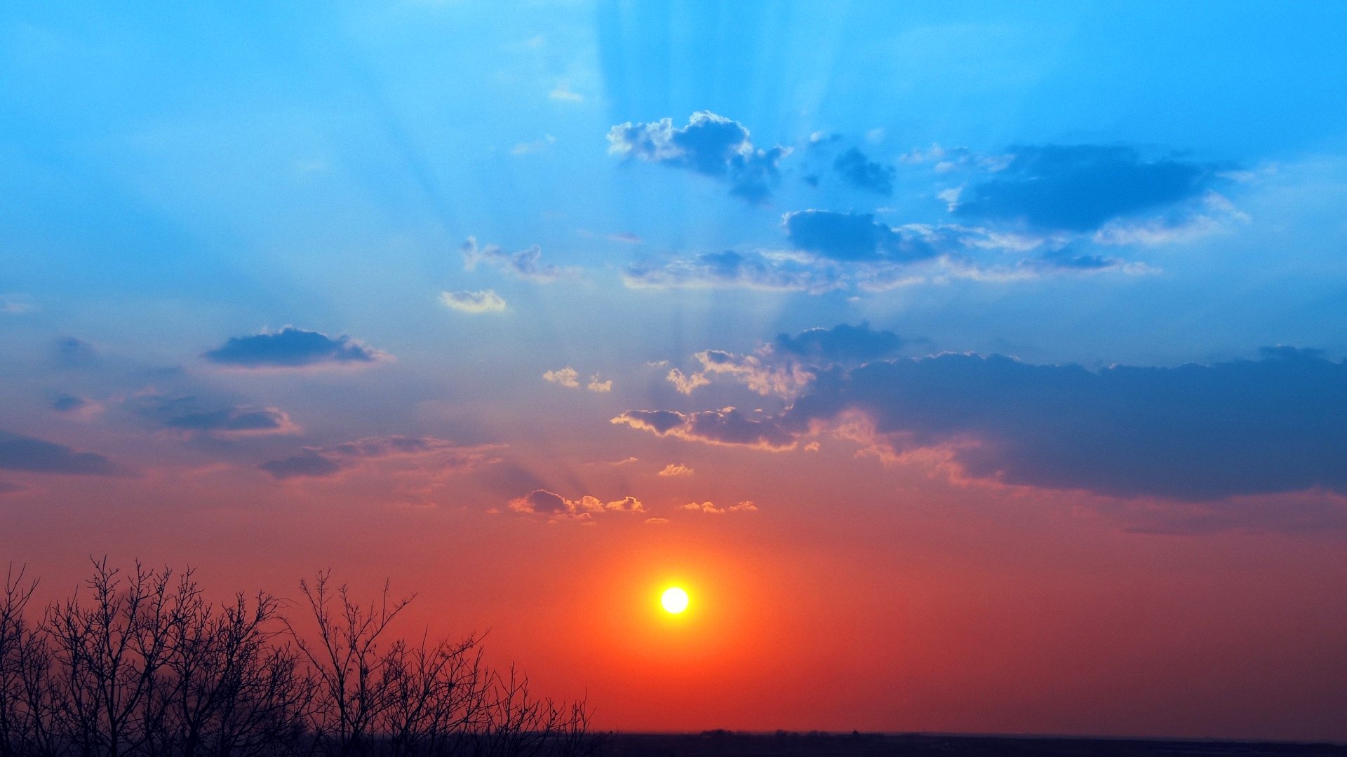 cielo nuvole sole tramonto raggi orizzonte