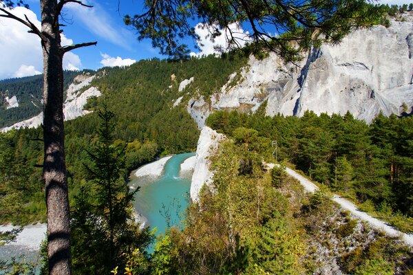 The river flows in the high mountains