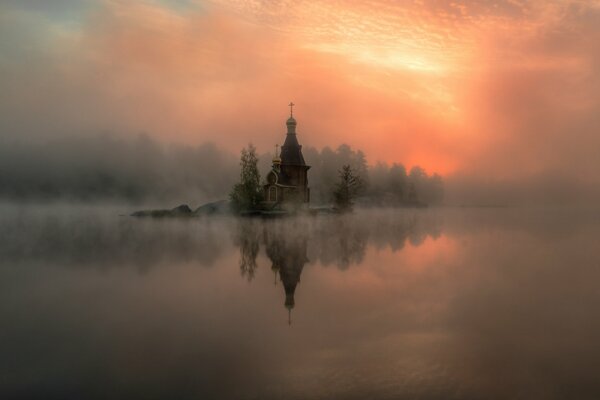 The river is in a fog. Haze. Russia