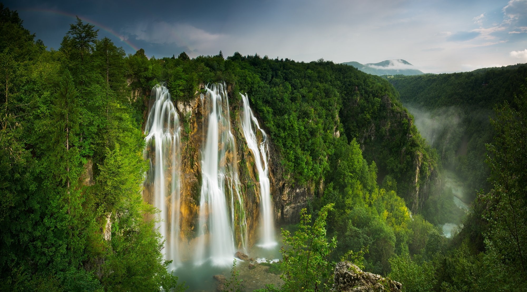 mountain forest valley river waterfall rainbow