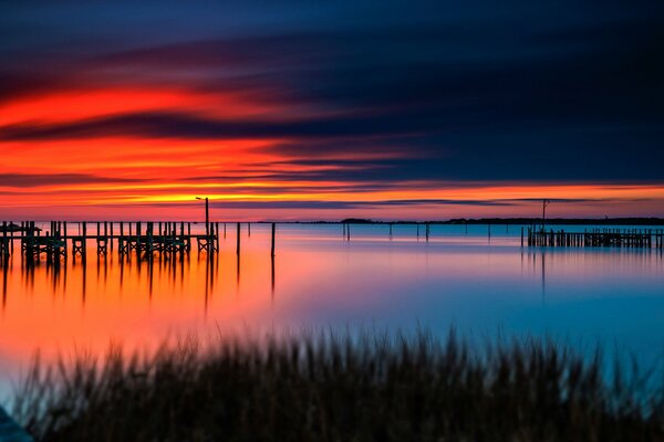 Spectacular fiery sunset over the lake