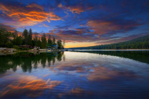 Reflection of the red sunset in the lake