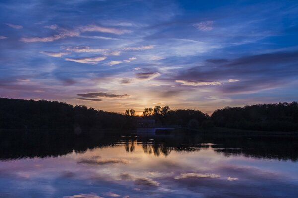 River. Reflection of the sky. Forest