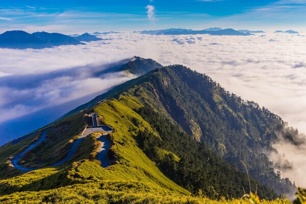 Tuiannoe morning in the mountains of Oblok above the forest of nature, the panorama wakes up and comes to life