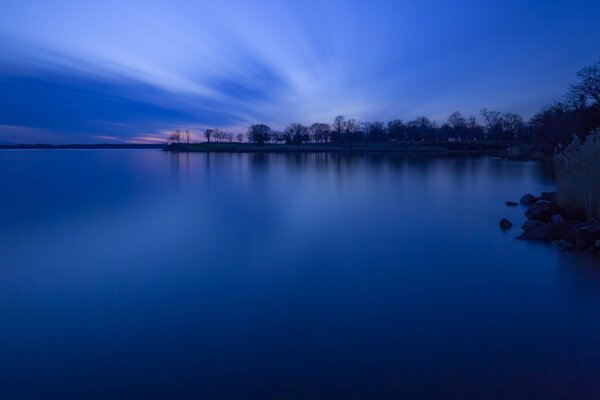 A large lake in the blue twilight