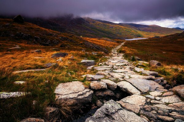 A peninsula in the UK is a path made of stones