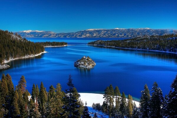 Fresh lake on the background of a mountain range