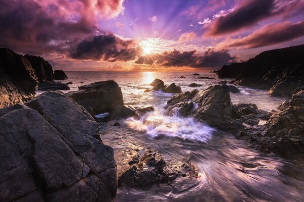 Surf rocks. Purple sky