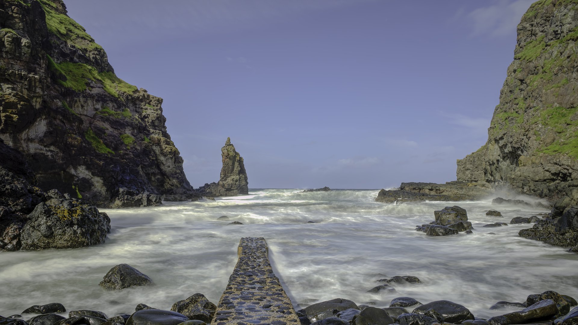 bay water waves stones rock pier