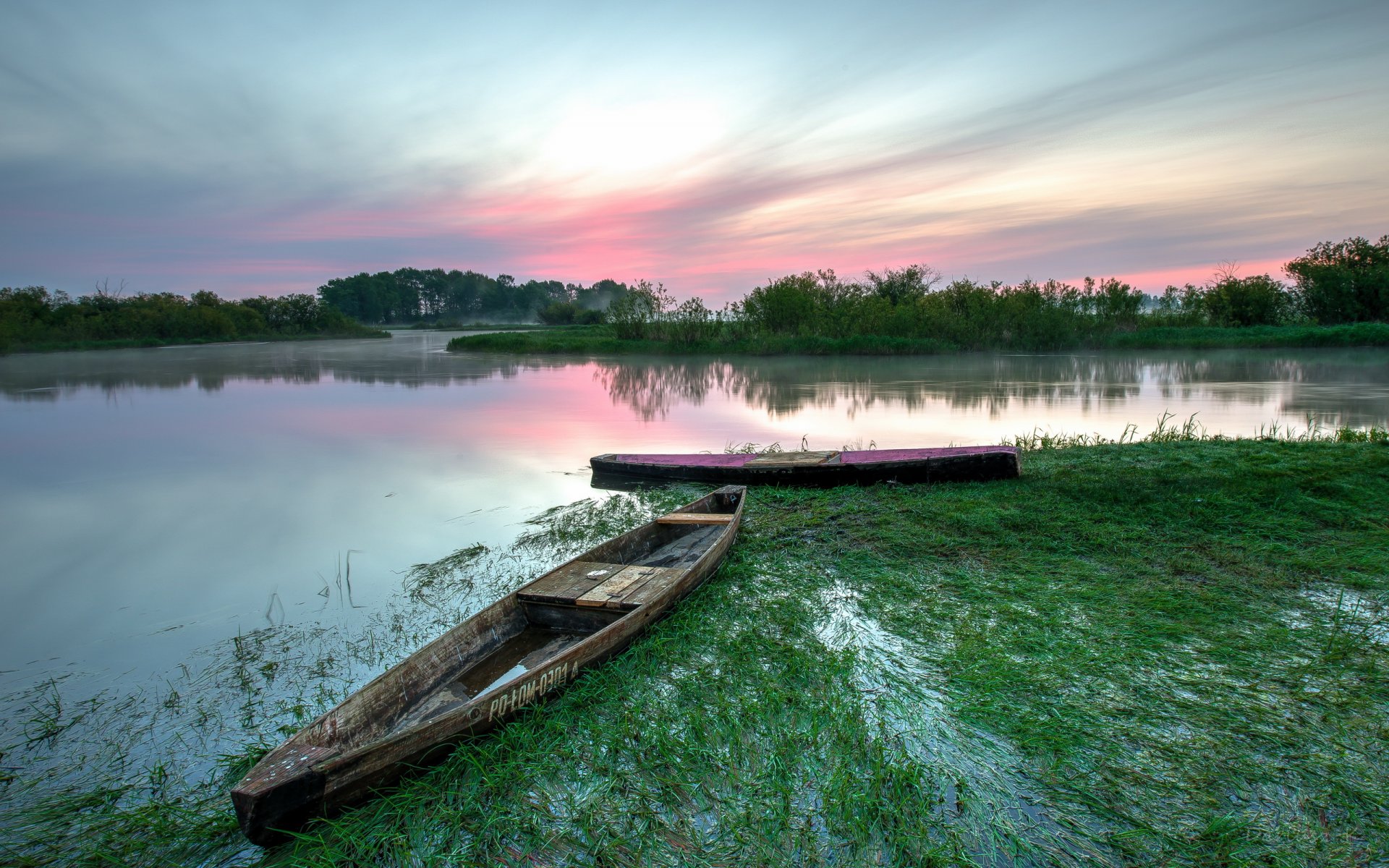 poland biebrza national park lake boat morning dawn summer