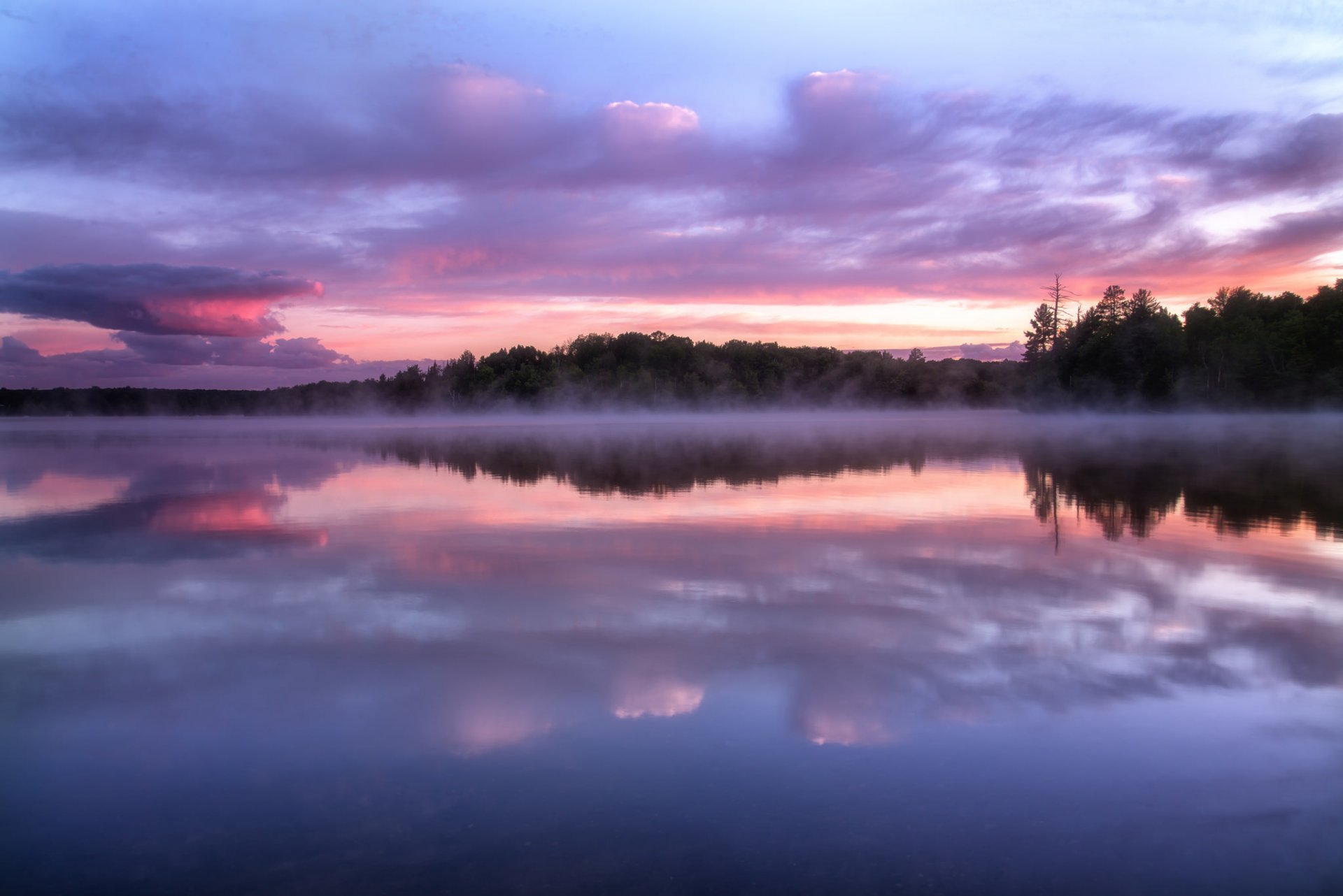 united states wisconsin night forest tree fog haze sunset sky clouds lake reflection