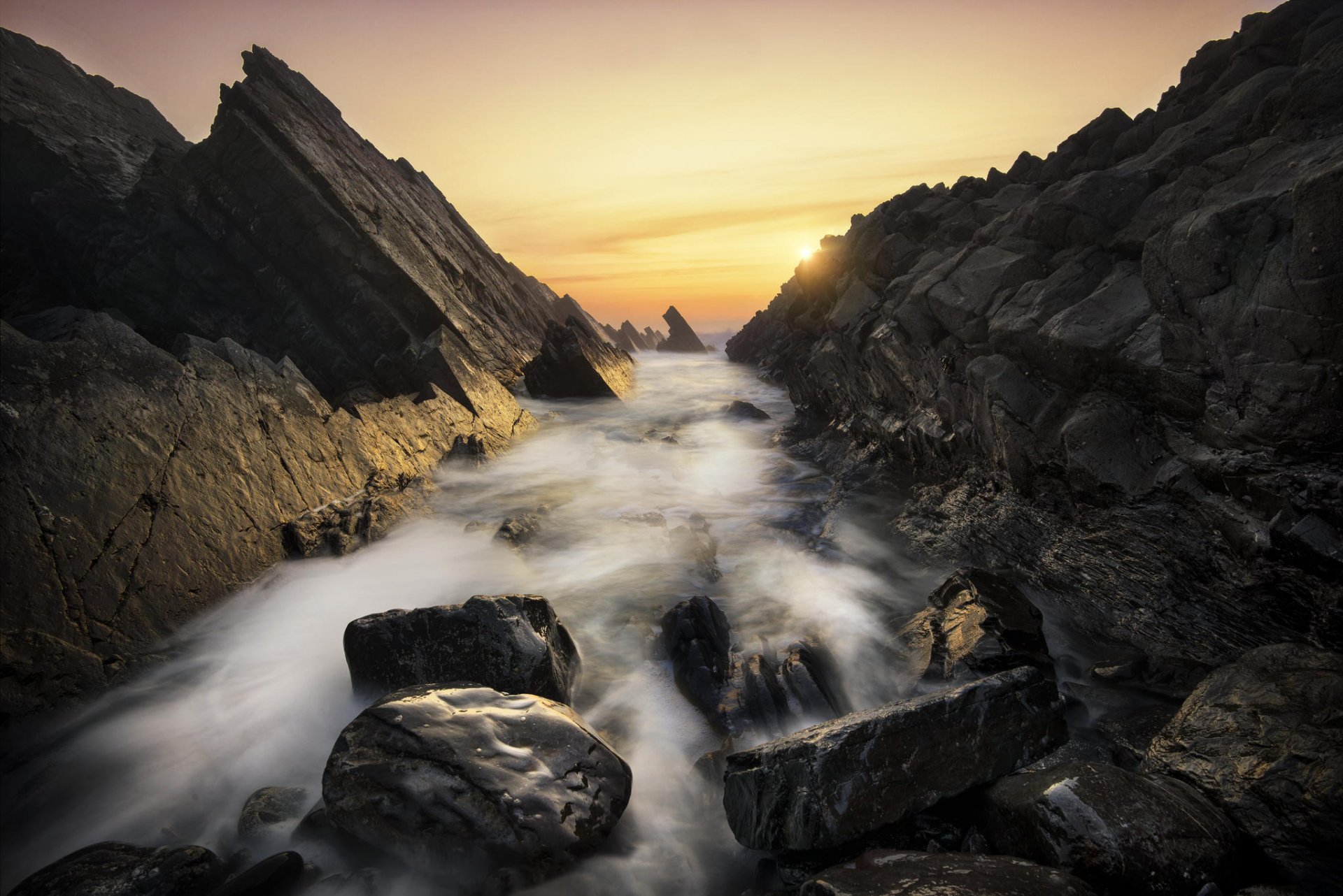 felsen steine wasser sonne