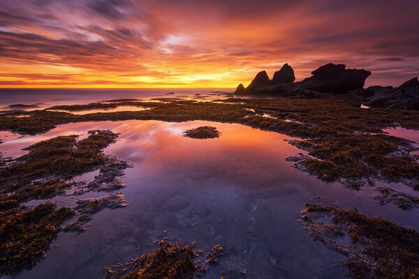 Red sunset of the technical island