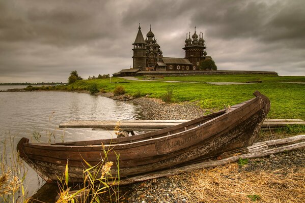 Boat on the shore of Kizhi, in the background