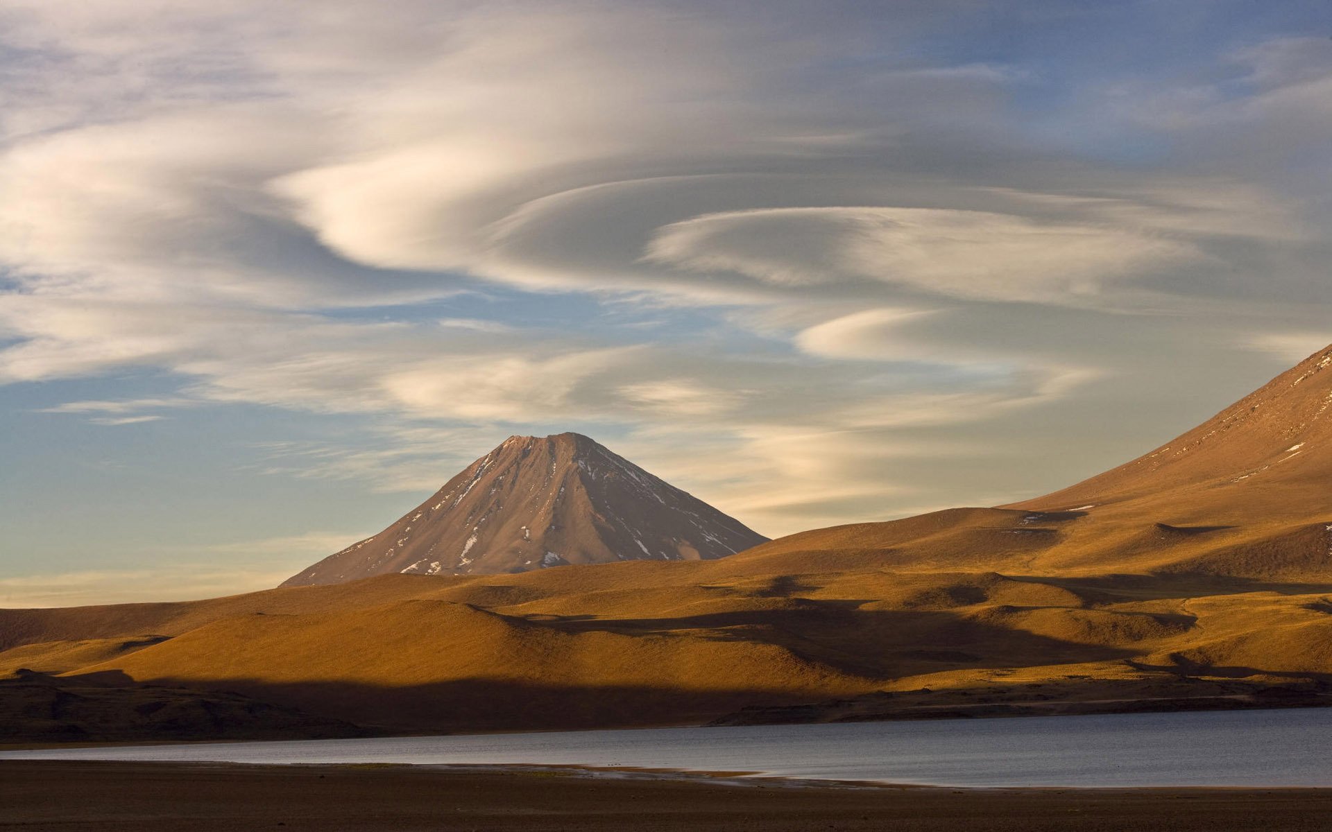 mountain slope sky clouds lake nature