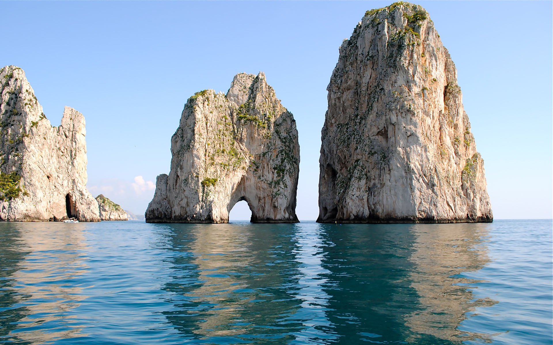 mar rocas arco superficie reflexión océano