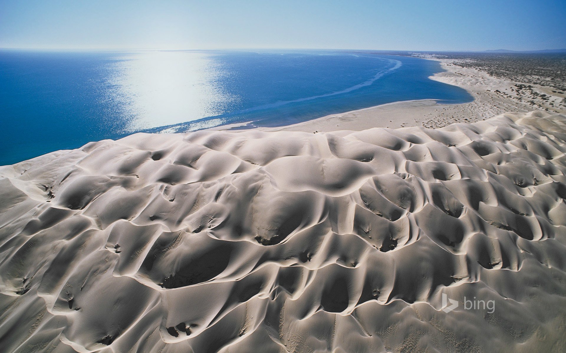 paysage mer soleil sable dunes ciel éblouissement