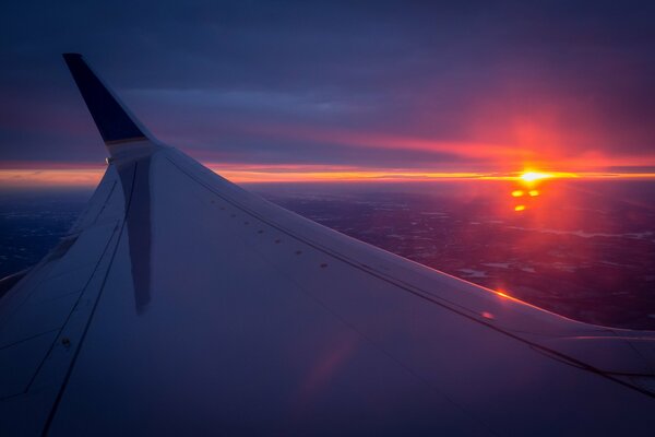 Vue de l avion au coucher du soleil