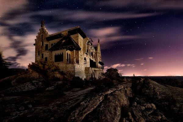 An ancient castle on the background of the night sky