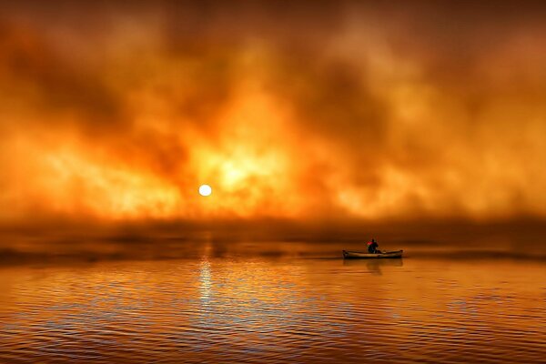 Bei Sonnenaufgang im Nebel ist ein Mann in einem Boot