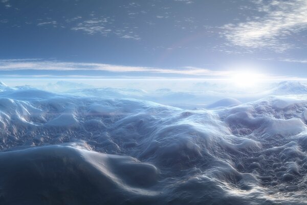 Paesaggio innevato con cielo blu del mattino