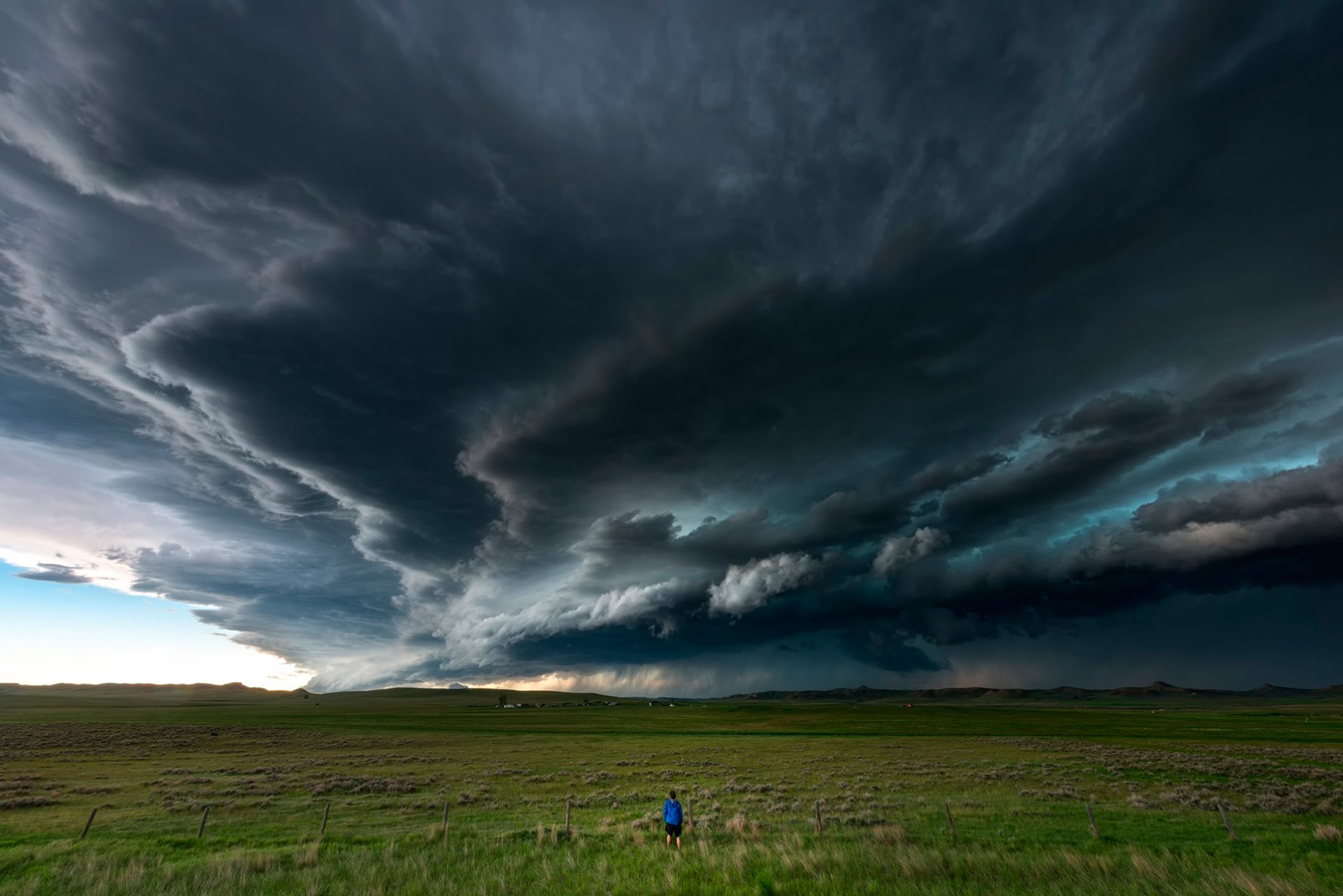 clouds storm the field man poem