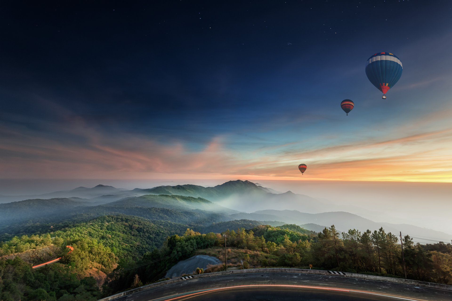 road hills balloons night