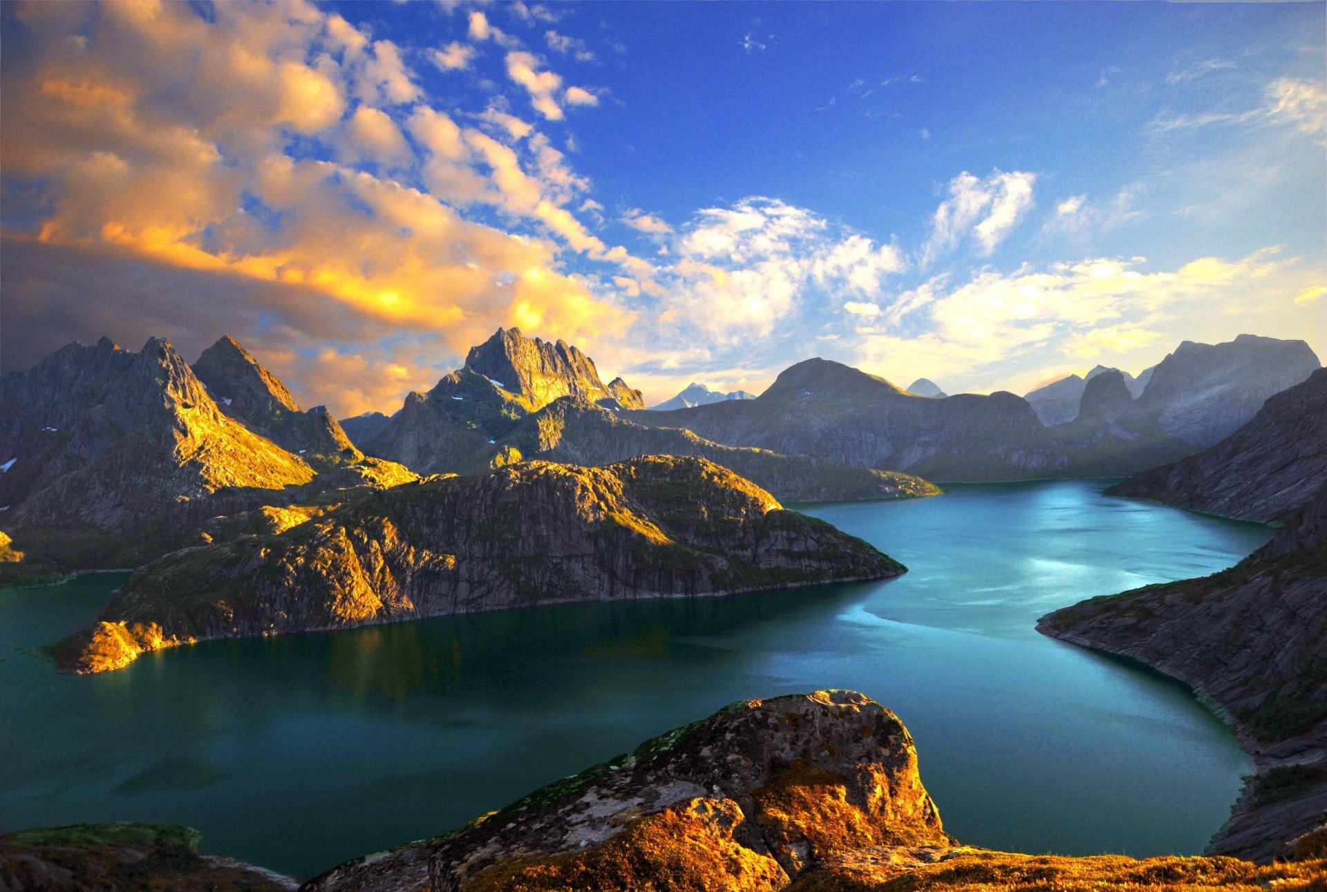 mountain fjords sea clouds lake stein liland norway sunset