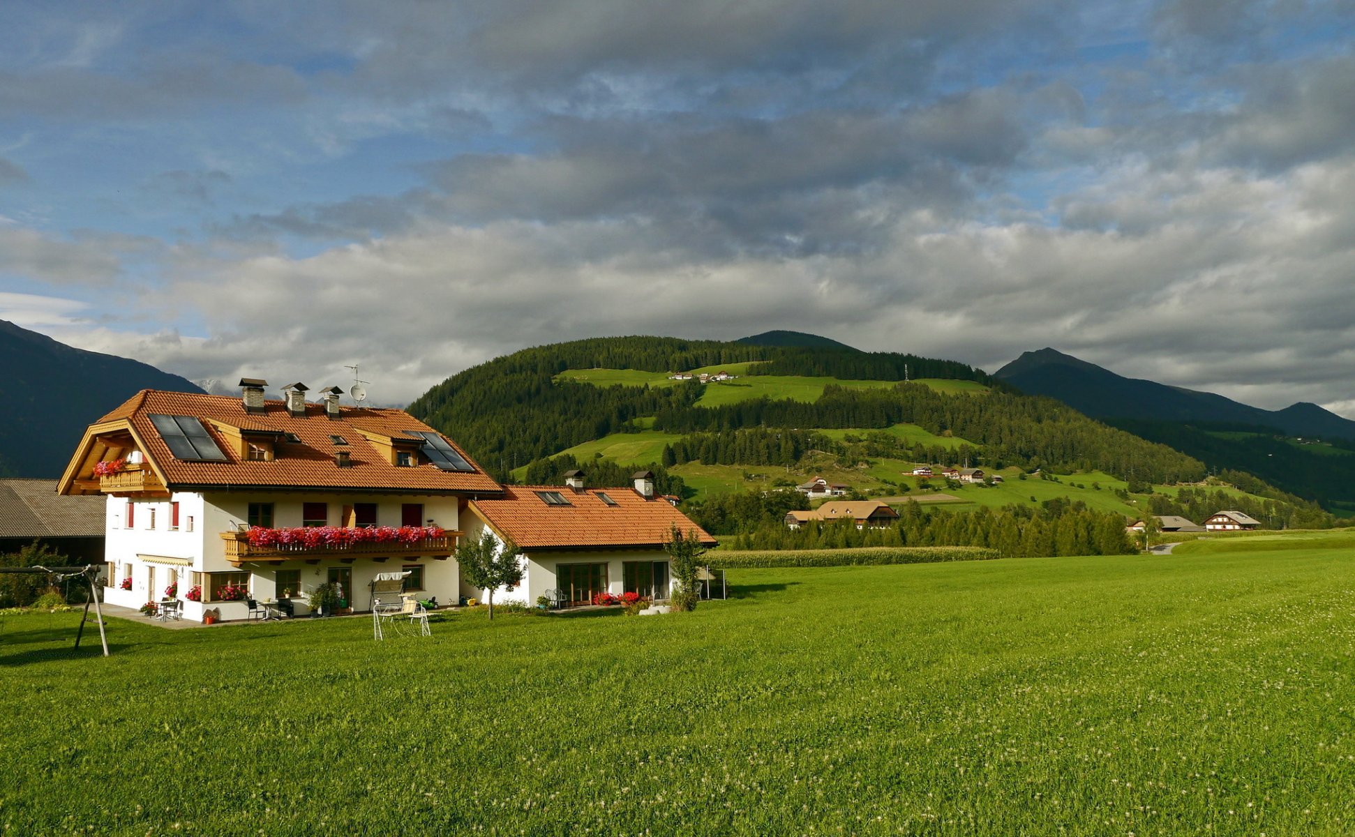 italy house mountain meadow valdaora grass town photo