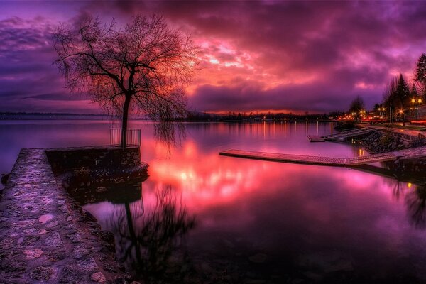 Icy sunset landscape over the lake