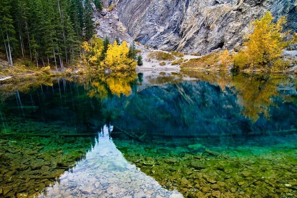 Colorful reflection of the lake in the mountains