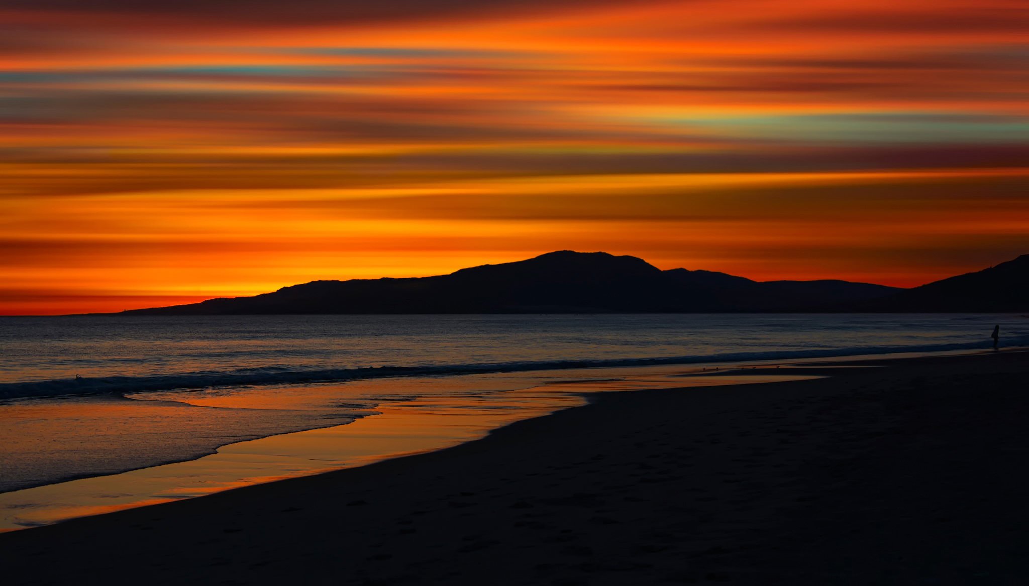 calme coucher de soleil sur la plage tarifa andalousie