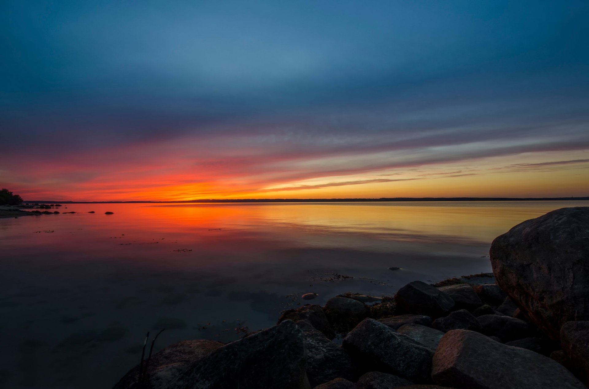 sonnenuntergang ostsee steine