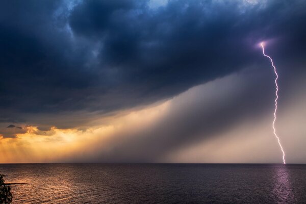 Bright lightning strikes the sea