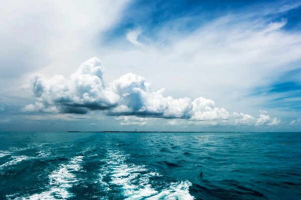 Beautiful clouds over the blue ocean