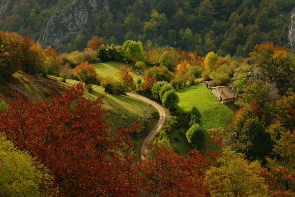 A lonely house. Road. Hills