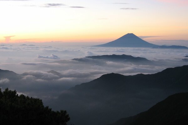 Volcano in the clouds. Fujiyama. Japan