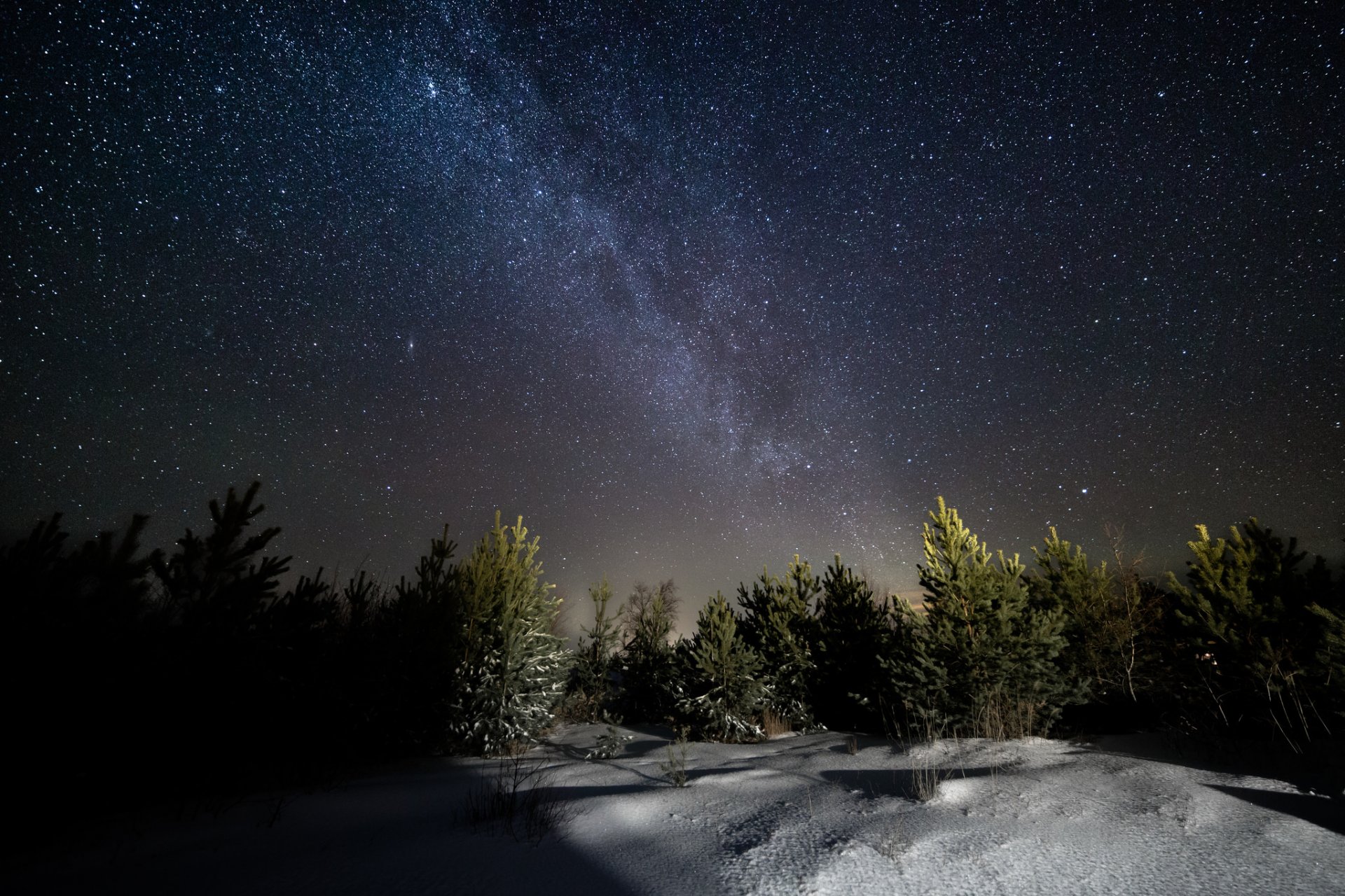 milky way night winter snow