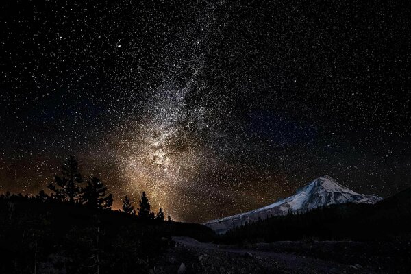 Night. The sky rests against the mountain