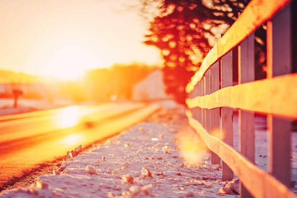 A road flooded with bright sun